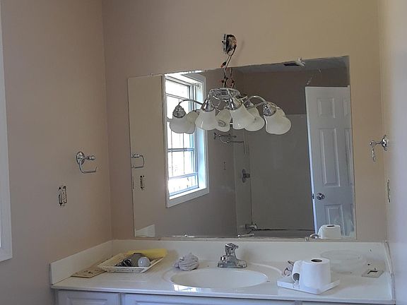 Bathroom vanity.faux marble tub and shower combo