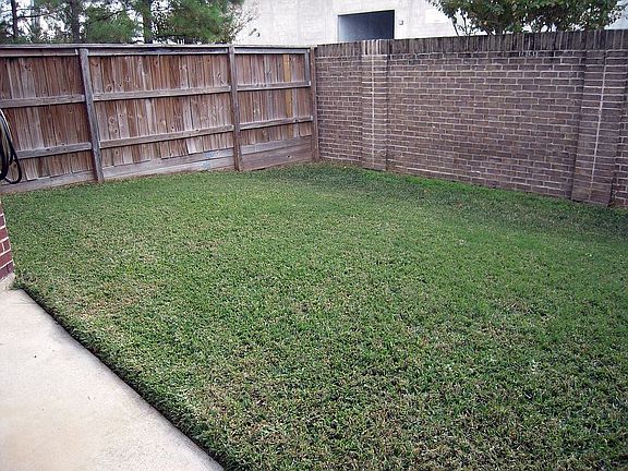 Fully fenced back yard.