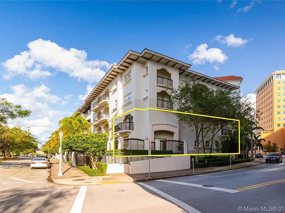 Villa Alhambra 2 story Villa with direct entry to your home WITHOUT USING THE LOBBY OR THE ELEVATOR! 2 Parking spaces are directly under the Unit! This is "NE Cities" Brownstone Home" in Coral Gables! The large SF (Over 2,800 ) has the feel of a home with