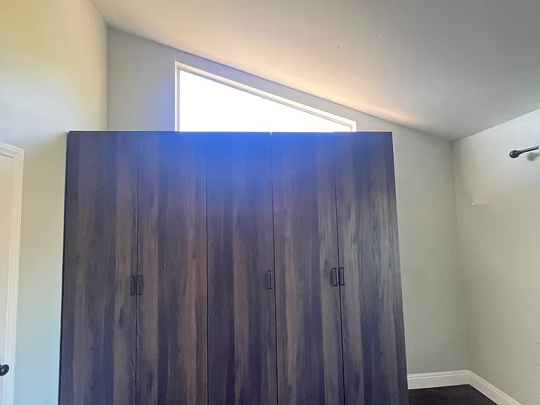 Wardrobe in the Master Suite and maple flooring