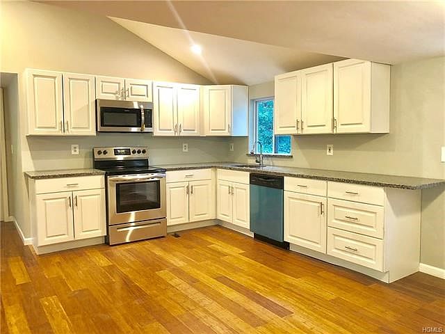 kitchen with a high ceiling