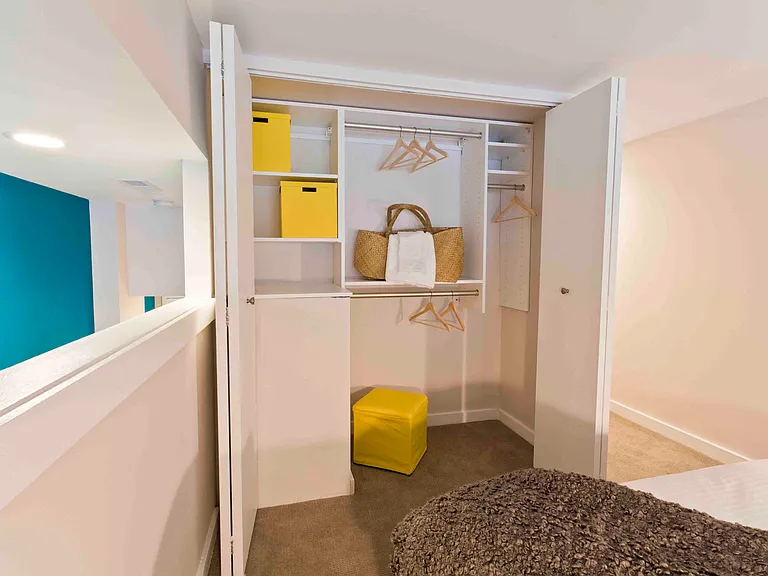 Spacious closets with adjustable shelving