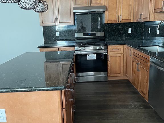 Kitchen - view from main entrance. Gas range and dishwasher included