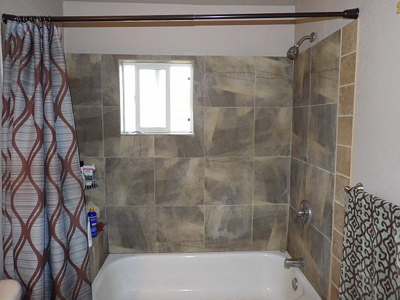 Hand tiled bathroom.