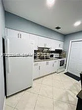 282 NW 55th St — Photo 13