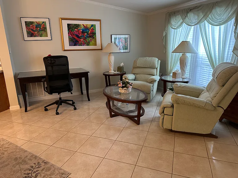 Living room with work desk and sitting area!