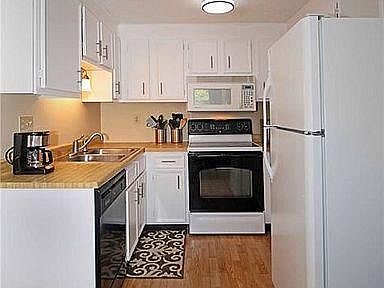 Kitchen - new sleek white cabinets
