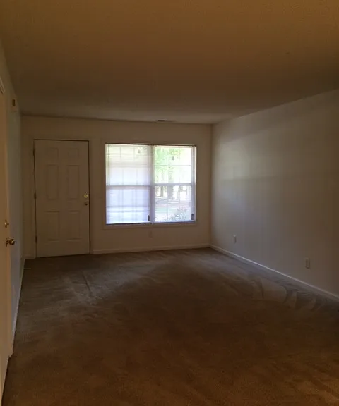 This unit has LVP flooring in the living room - shown with carpet