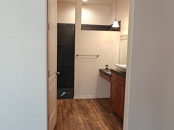Walk in tile shower, private bathroom, walk in closet