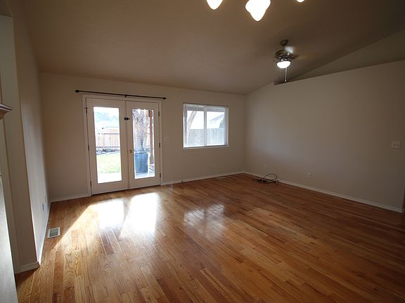 Living room with french doors going to patio