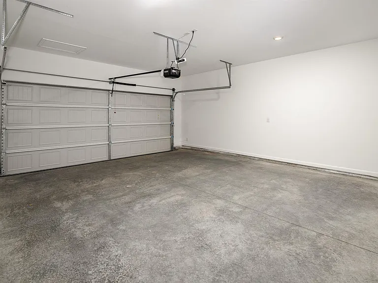 Interior view of the spacious garage at Baxter Woods.