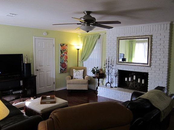 Family room, door into utility room, through to garage