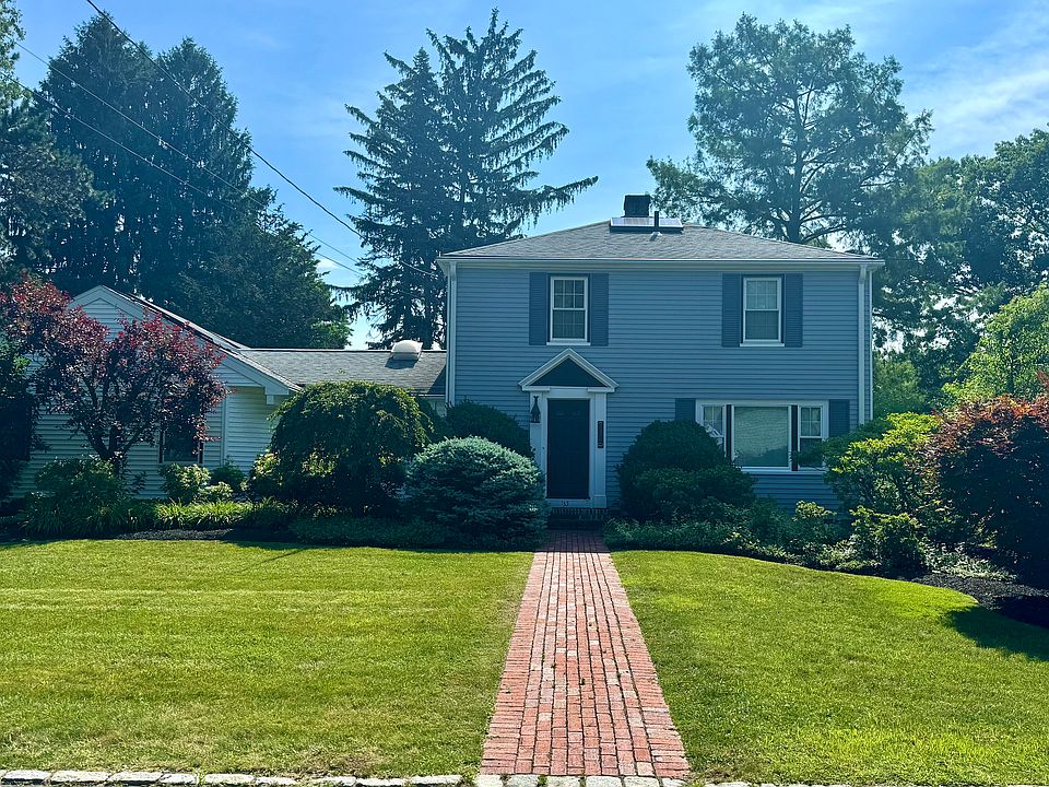 135 Oakcrest 4 Bedroom 2.5 bath contemporary colonial w/ 2 car garage, solar panels, koi pond, private yard/patio in an ideal location