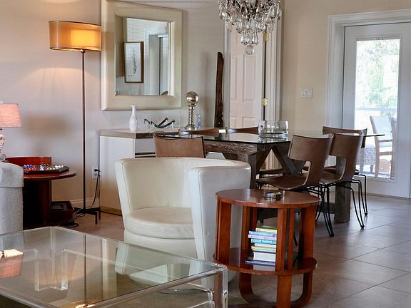 Living room area Big couch and dining table