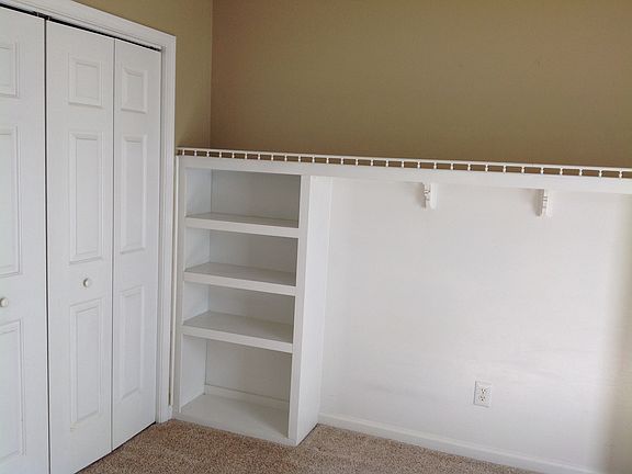 bedroom with built-ins