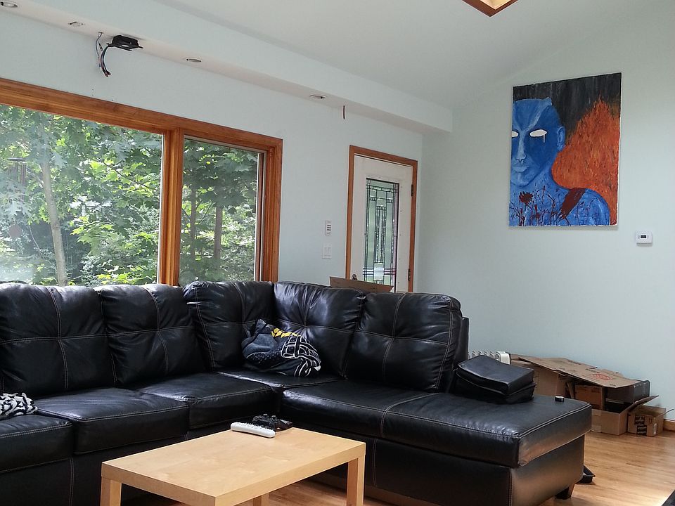 Living room, skylights have power blinds with control panel