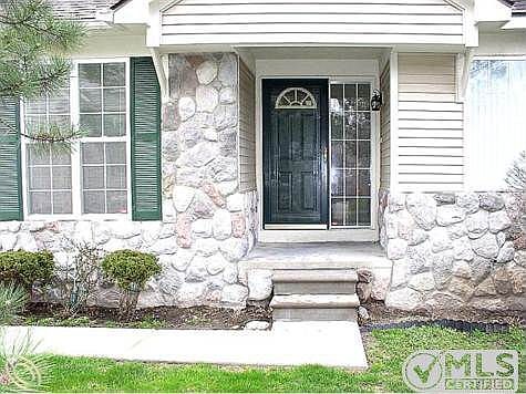 Side Entry w Stone Exterior.j