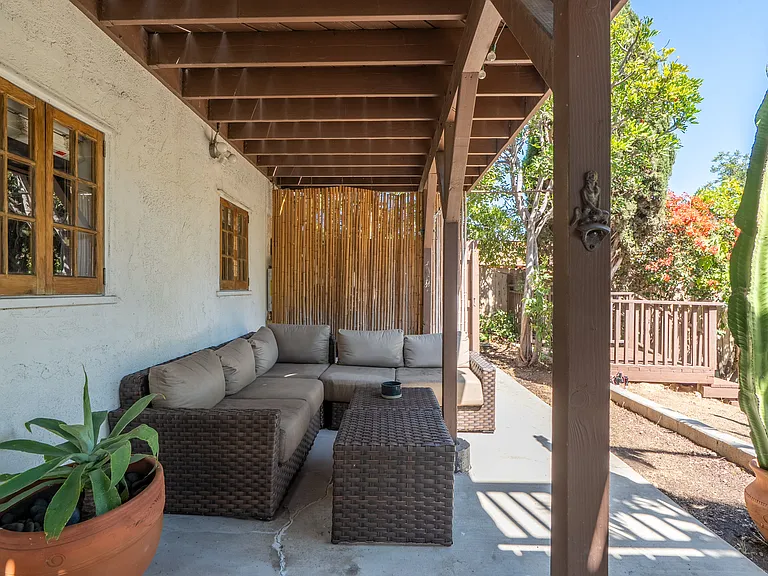 Outdoor living area (furniture included). Studio has exclusive use