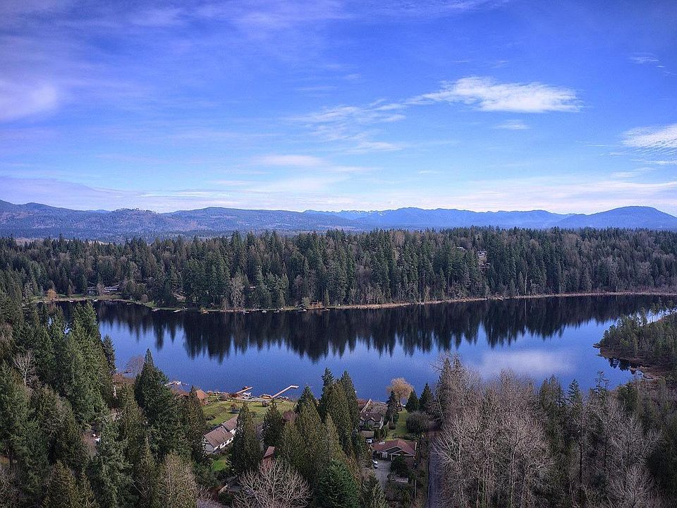 Spring Lake public access directly across from gated property, and hiking trails directly to the right.