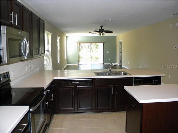 4th image of 7834 Tuscany Woods Dr
