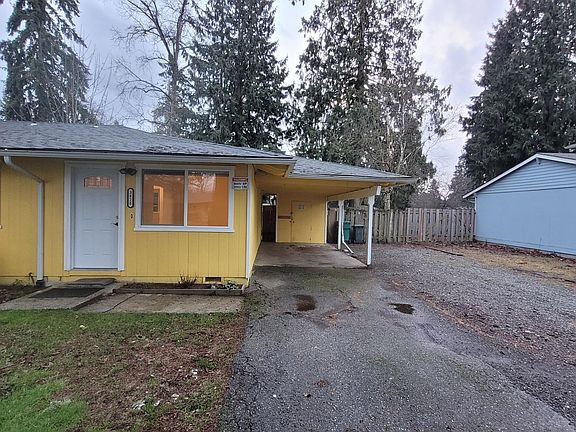 Private Driveway with covered car port.