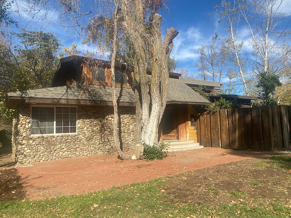 Front entrance with brick patio