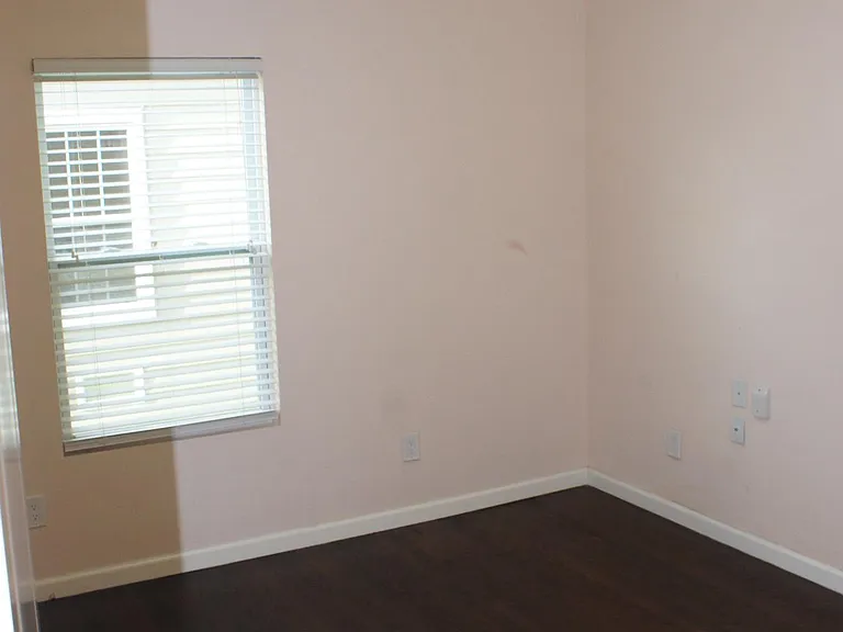 Back bedroom stepping in from the hall