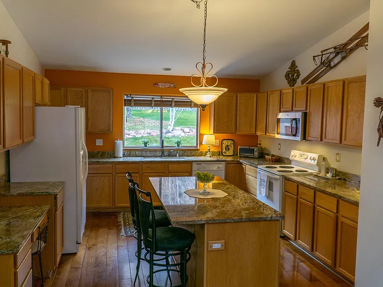 Toward kitchen and walk-in pantry