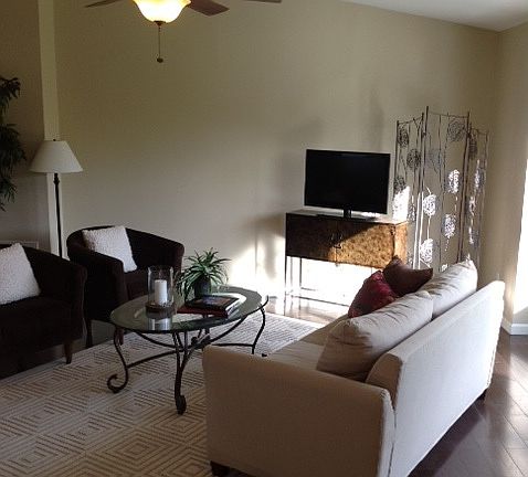 Living room complete with fireplace
