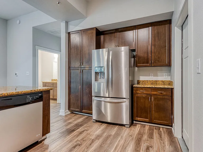 Open concept kitchen with stainless steel appliances
