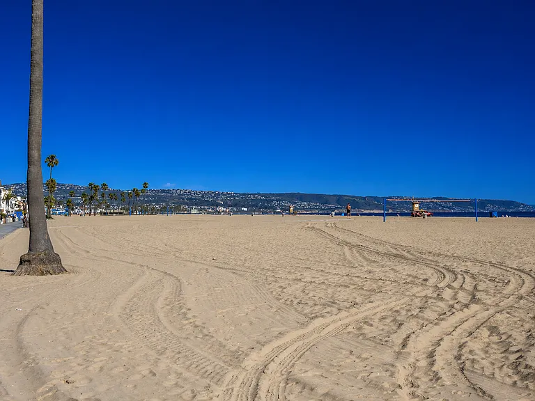 Expansive shoreline with scenic coastal backdrop