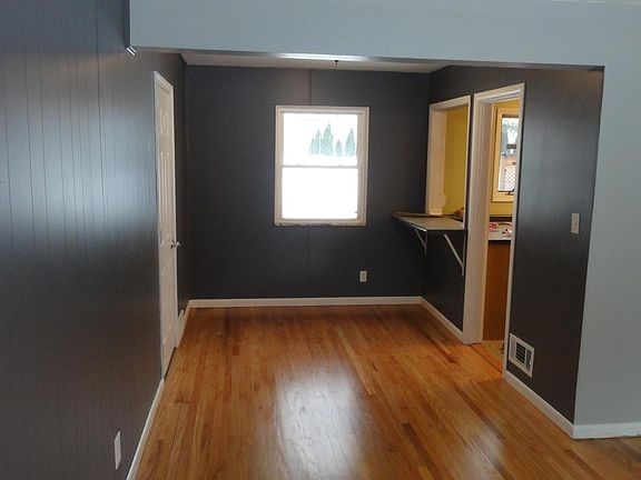 Dining area with kitchen to right