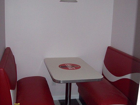 Booth area next to kitchen, NOT included