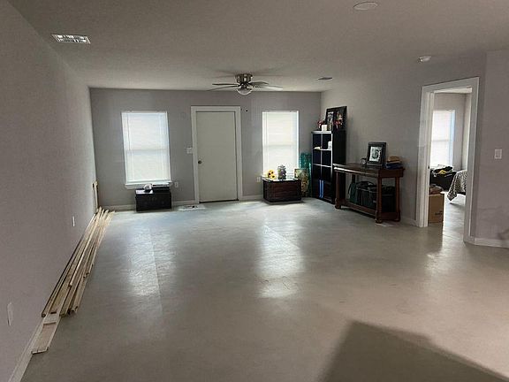 Living room with exterior back door