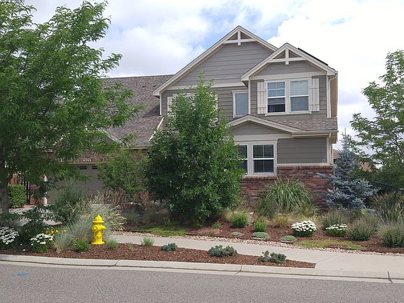 Xeriscaped front + side yard