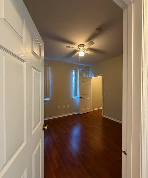 Room 2: Spacious bedroom with convenient closet space.