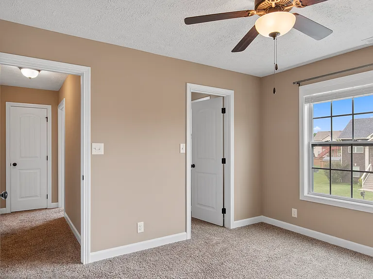Bedroom 4 has great view of neighborhood, walk in closet, and is closest to the full bath and laundry room