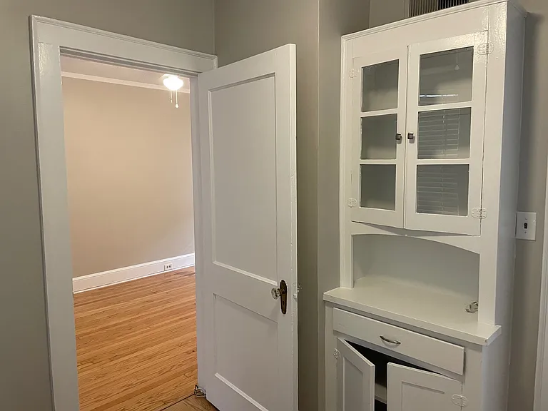 Breakfast nook between Living Room and Kitchen with rear entry to back deck