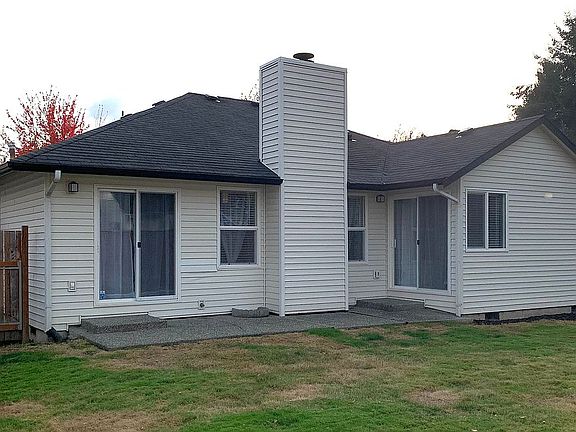 Back of Home w/Patio