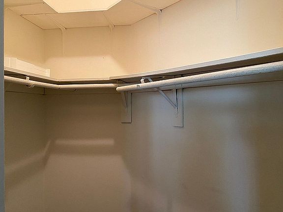 Master bedroom walk-in closet dining too