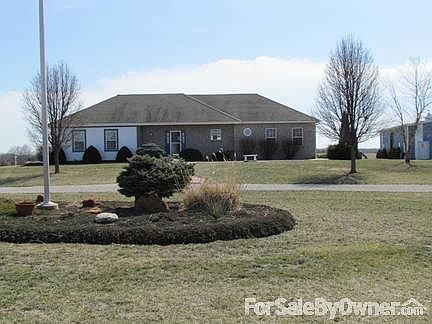 brick front and circle drive