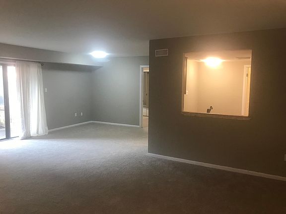 Open Concept Living/Dining (new carpet, fresh paint, new lighting)