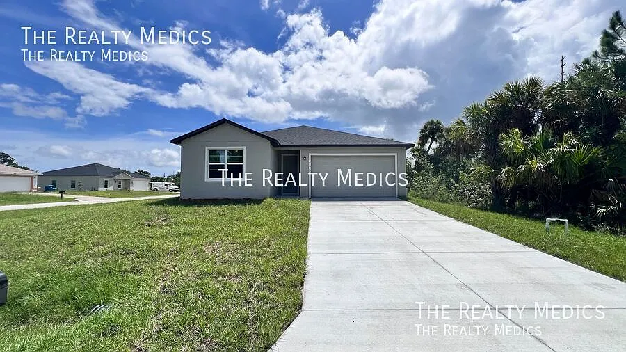 Spacious 3-Bedroom Home with Garage & Patio Palm Bay, FL — Photo 1