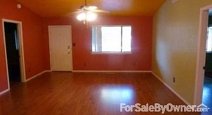 Living room : Second bedroom on left, master bedroom on right.