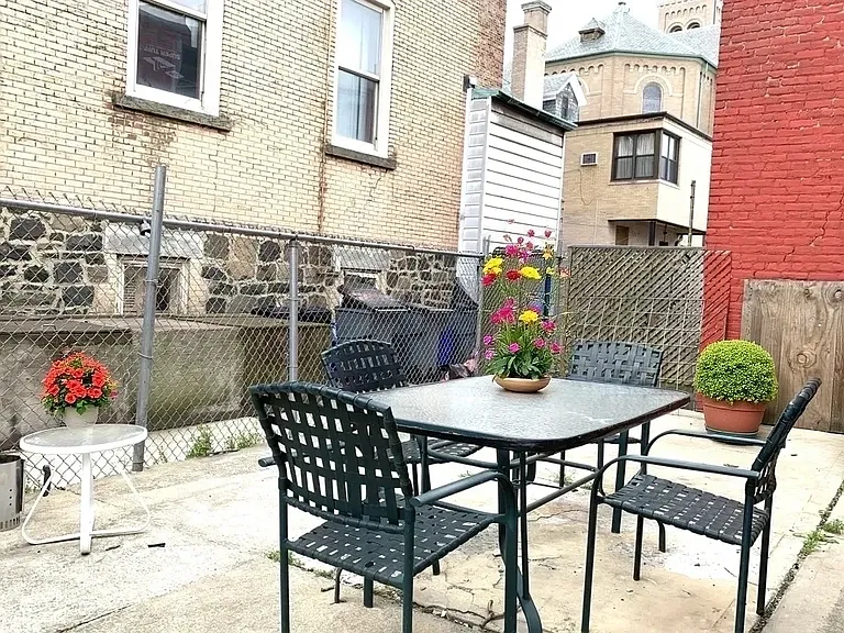 shared backyard - easy to maintain - all pavers