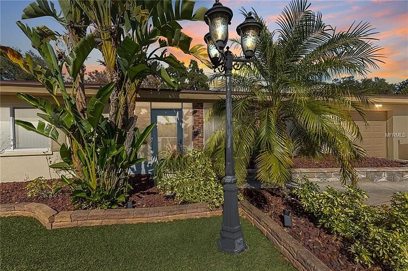 Meticulously maintained.  Artificial grass makes yard maintenance easy!  One of the few homes in Dunedin that obtained a permit for the artificial grass installation.  Walk to Dunedin Community Center and Dunedin Fine Arts Center.  Bike to the Beach or downtown Dunedin.