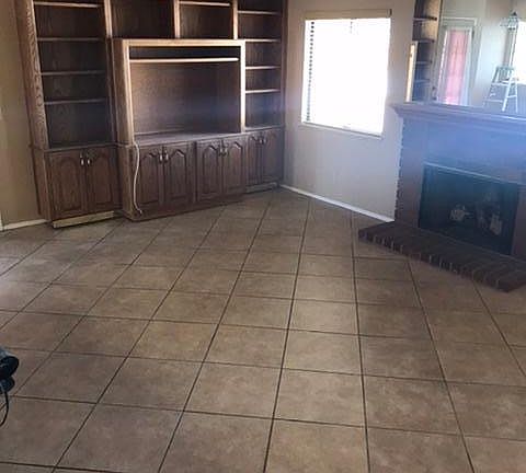 Fam room, gas fireplace, built in cabinet