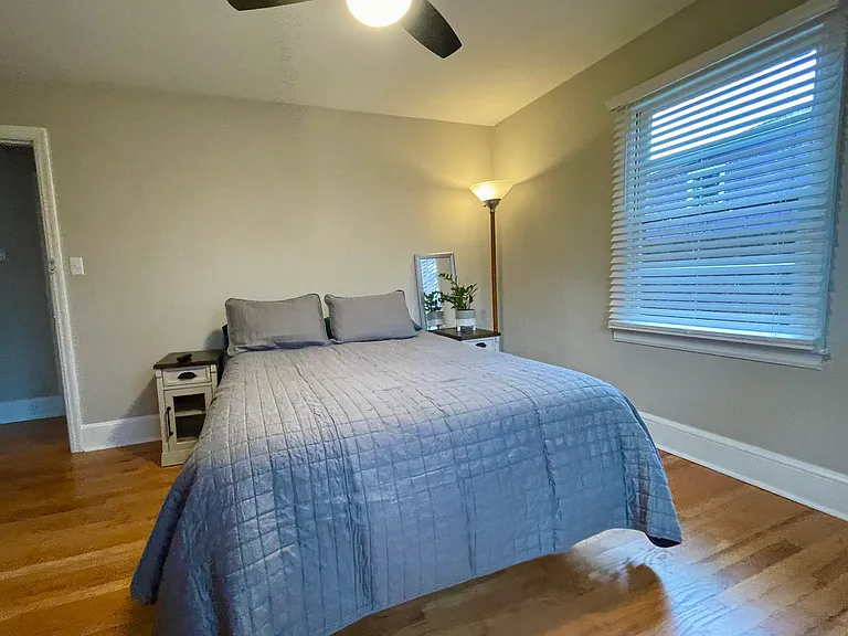 Bedroom w/ Full closet and ceiling fan. Two Windows , White Oak Hardwood Floors, Newly Refinished. Freshly Painted.