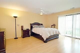 Large master suite has a W/I closet, dressing area, bath, and a balcony.