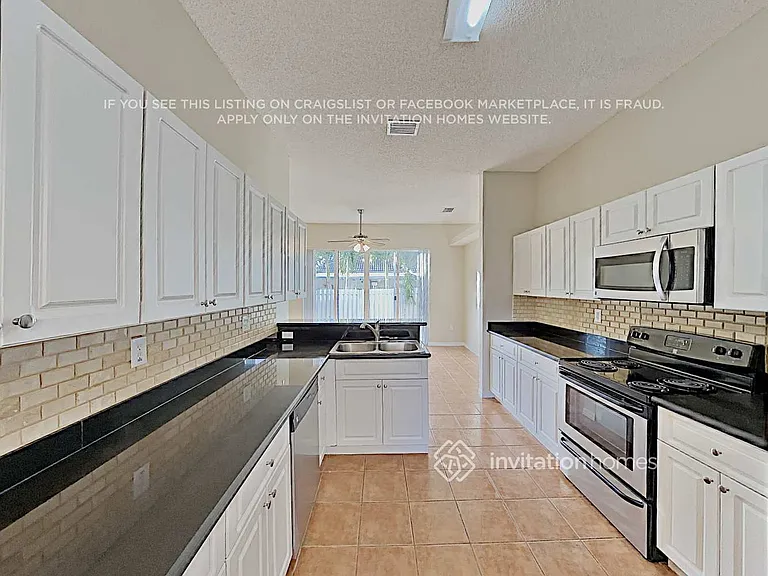 10698 SW 20th Ct — Photo 10